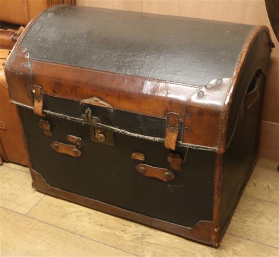 A leather trunk on wheels, W.69cm